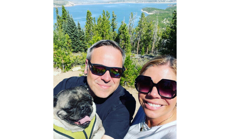 Photo of Michael Anderson, Andrea Argy and their pet pug, Bruce Lee.