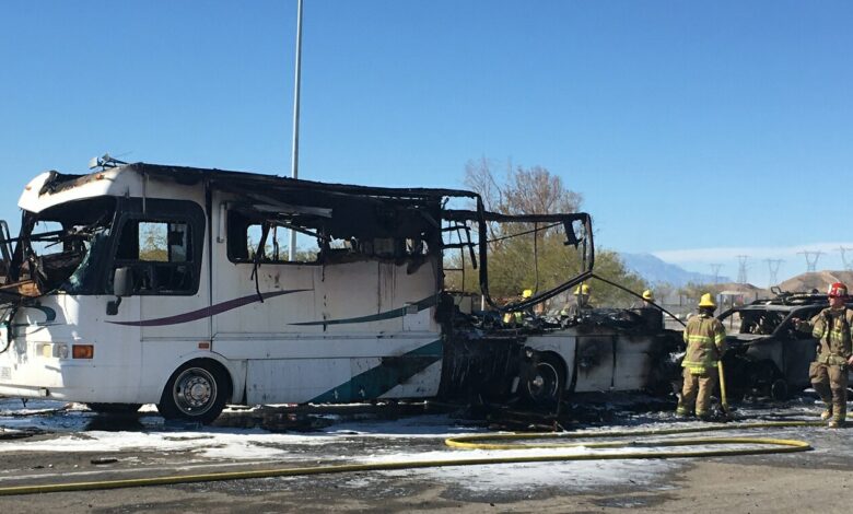 A photo of the remnants of Chris and Michele Small's RV and tow vehicle after a fire.