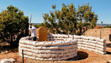 Photo of some building an earth structure at Las Caranaras Canyon Ranch.