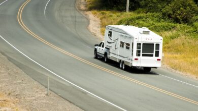 Photo of a fifth wheel RV on the road
