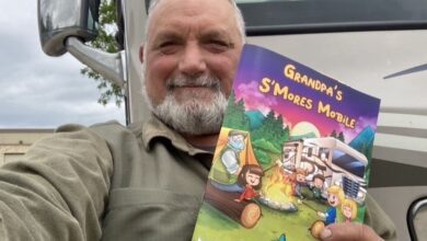 Photo of Richard Duhaime and his children's book "Grandpa's S'Mores Mobile."
