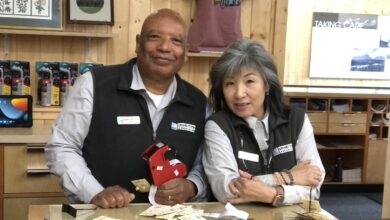 Photo of Daryl and Yong Galloway, who recently completed their 10th Anniversary at Colter Visitor Center in Grand Teton National Park.