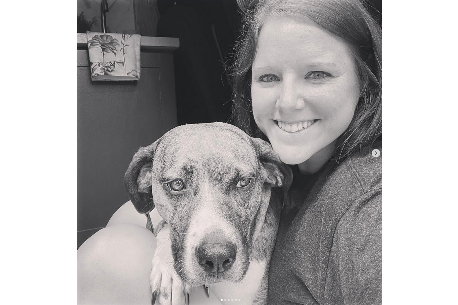 Photo of Georgia Gleason and her dog, Maggie.