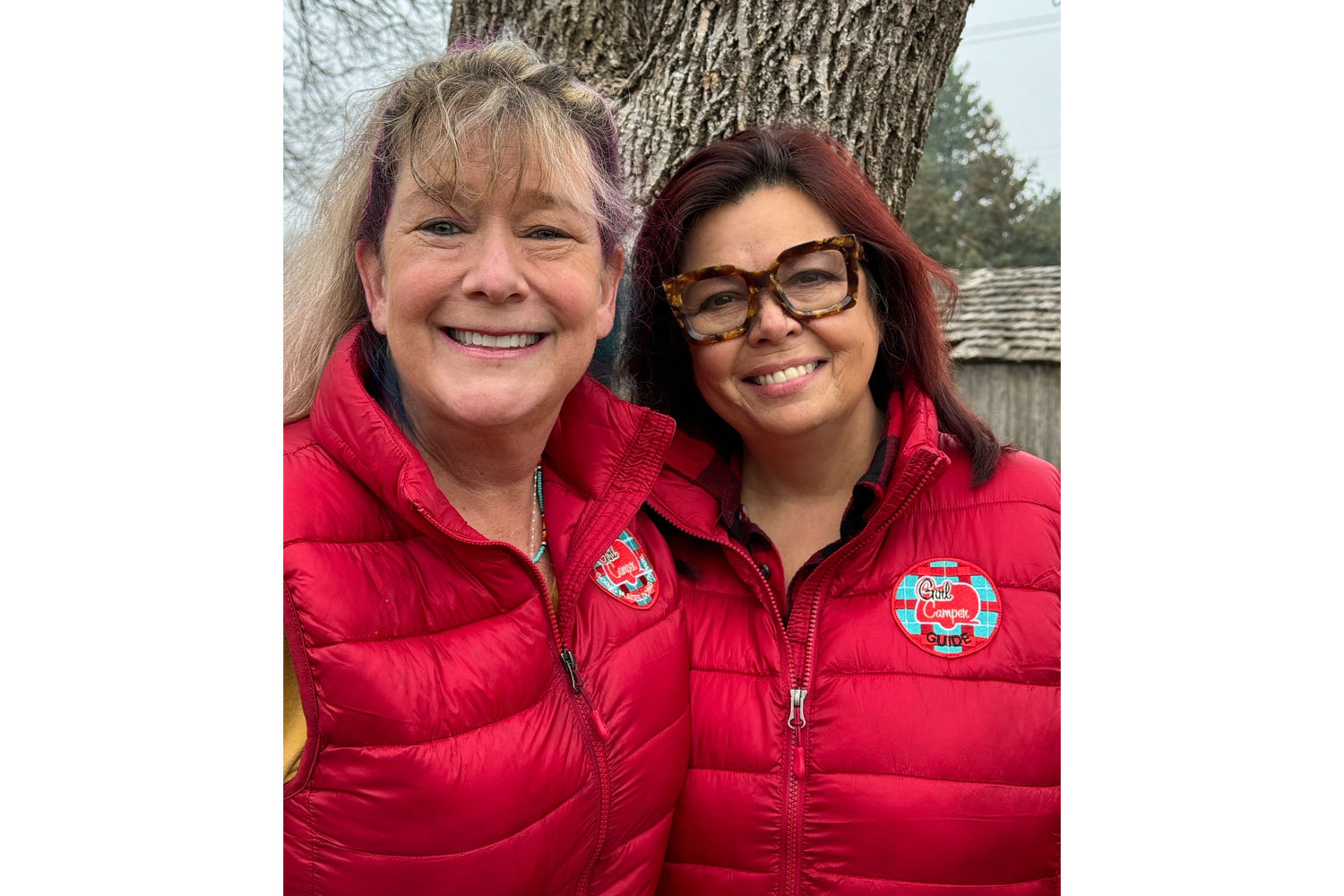 Photo of Lesa McDermott and Mary Byrnes, with Girl Camper.