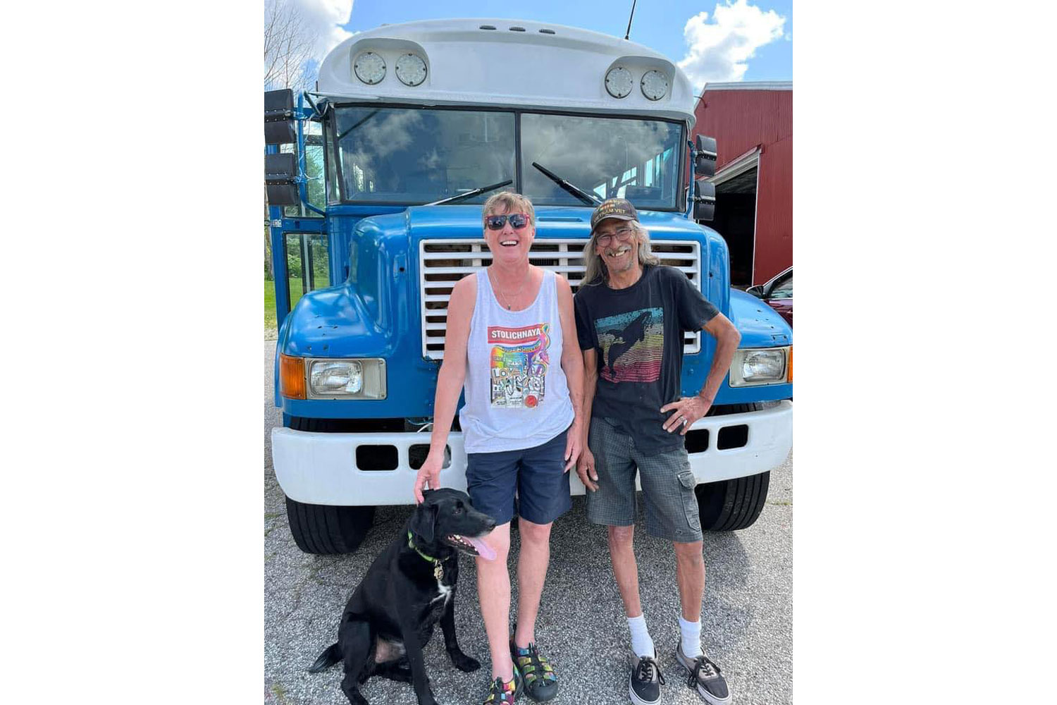Mandy and Allen Hallengren in front of their converted school bus.