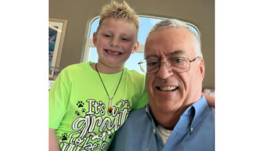 Charlie Parrish with Cash, his chief engineer, when Choo-Choo Charlie is driving the train.