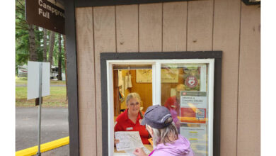 Wanda Likens (husband Rick Likens in the background) during their second season.