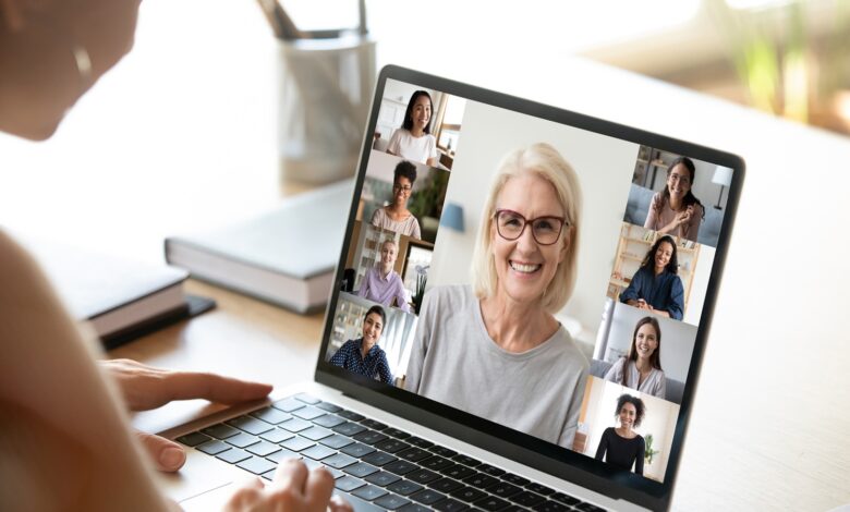 Photo of a Zoom call between boss and workers.