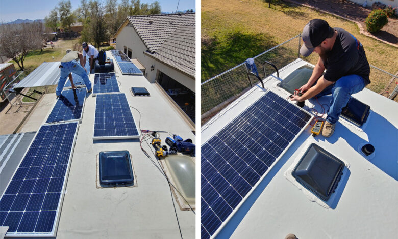 Nick Sauble, front, and Justin Mowery installing an array of solar panels on top of an RV.